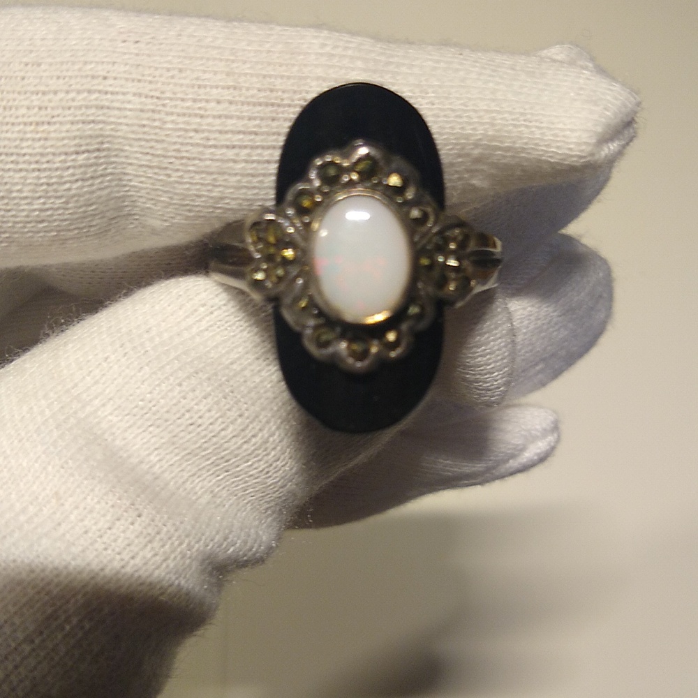 Opal, Silver, and black ring